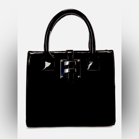 JustFab Handbags - NWT: Just FAB bag.Comes with shoulder strap.